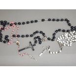 Three sets of rosary beads & two cross bead rings