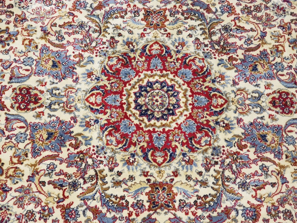 A Persian wool rug with floral motifs on cream ground 170 x 116cm - Image 2 of 3