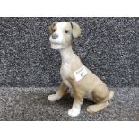 A Lladro sitting dog 19cm high.