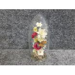 Vintage dried flowers and butterfly in glass display dome case