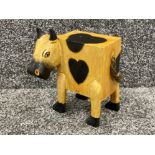 Unusual wooden money box in form of a Cow