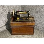 Antique cased singer sewing machine