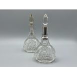 Pair of sterling silver scent bottles cut crystal. Hallmarked London 1927 (Not apart of the estate)