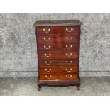 Vintage mahogany 7 drawer chest of drawers on carved base with feet.