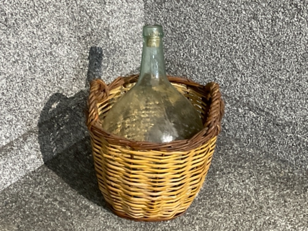 Large glass carboyand wicker basket