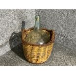 Large glass carboyand wicker basket