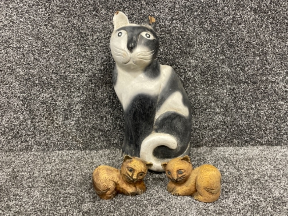 Large wooden cat figure (lost part of ear to another cat) and 2 small wooden cat figures