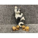 Large wooden cat figure (lost part of ear to another cat) and 2 small wooden cat figures