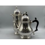 Sterling silver Teapot and coffee pot with roped edge design. (53oz) (Not apart of the estate)