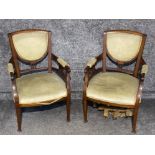 Pair of early 1900s mahogany arm chairs (will benefit from being re-upholstered)
