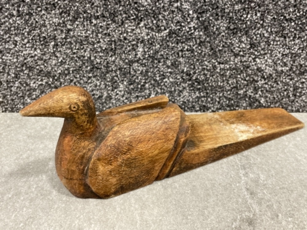 Vintage doorstop in shape of a bird