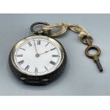 Ladies sterling silver pocket watch and key (Not apart of the estate)