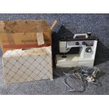 A Jones sewing machine VX 710-3, cased and boxed.