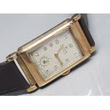 Gents 9ct yellow gold Rolex wristwatch with brown leather straps & rectangular case, cream dial,