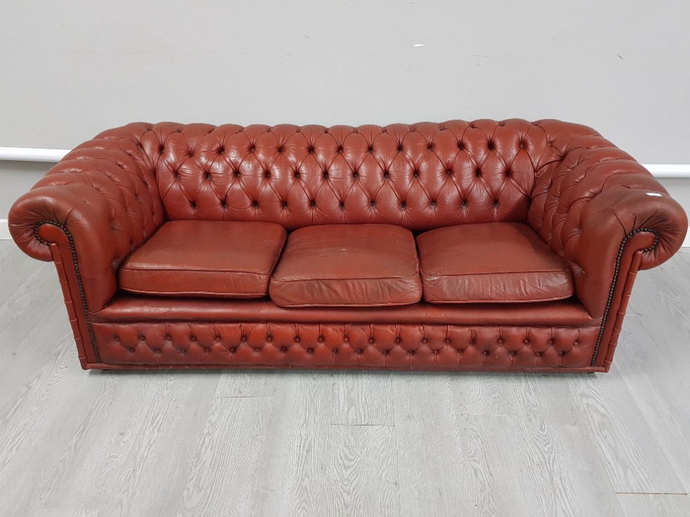 Metal studded red leather 3 seater chesterfield settee