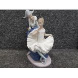 Large Nao by Lladro sitting Ballerina & Harlequin boy figure, height 30cm