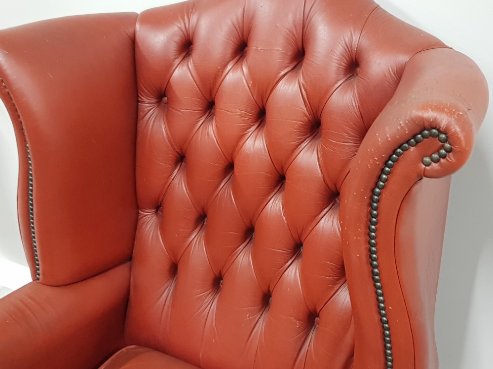 Metal studded red leather chesterfield wing back armchair - Image 2 of 2