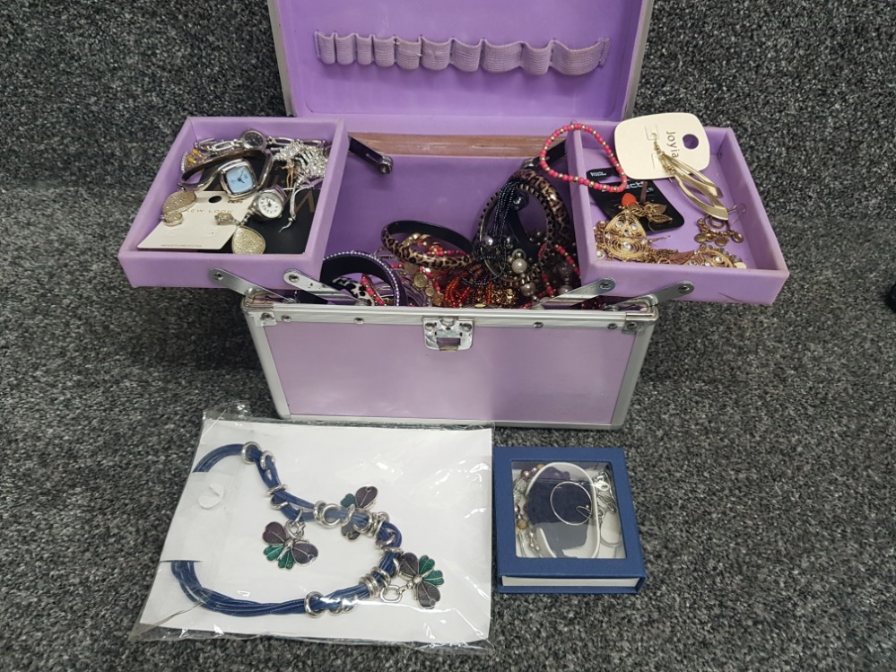 Cantilever jewellery box containing miscellaneous pieces of costume jewellery including bangles,