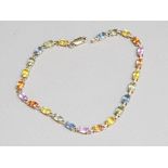 Ladies 9ct yellow gold stone set bracelet comprising of multicolored stones, 5.4g gross