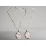 2x ladies oval shaped silver lockets with chains, both engraved, 42.4g