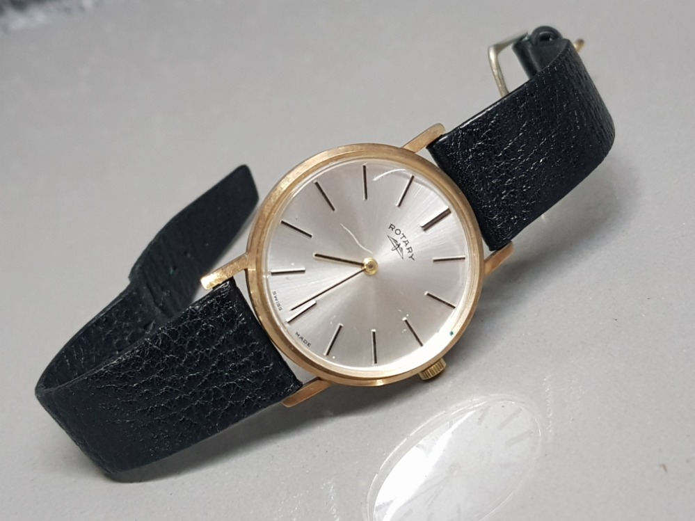 Gents 9ct gold Rotary wristwatch with black leather straps & champagne dial, manual wind, engraved