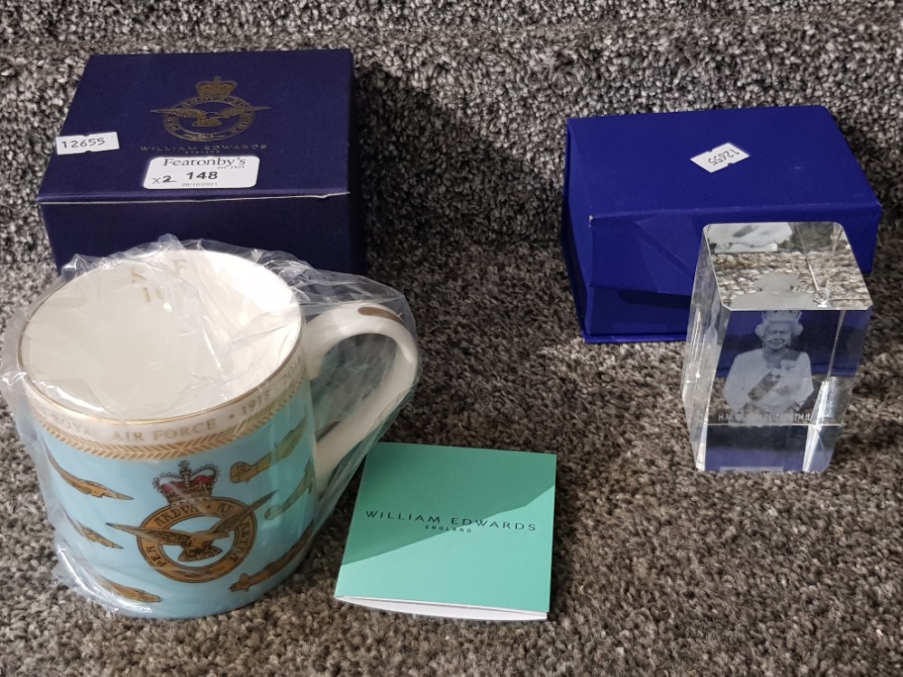 A William Edwards spitfire RAF mug in original box and a royal commemorative glass paperweight