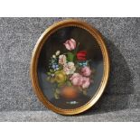 Gilt framed oval shaped oil on board painting, still life signed by artist bottom right R.Rosini,