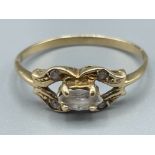 Ladies 14ct gold and white stone ring. Featuring a Marque set in centre and with 4 stones in