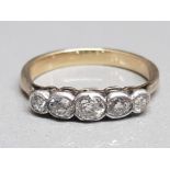 Ladies 9ct yellow gold 5 stone diamond ring, comprising of 5 old cut diamonds set in a rub over
