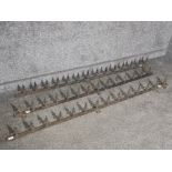 Three decorative spear top wrought iron fence toppers, 178cm