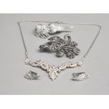 4 items of rhodium plated marcasite set jewellery