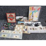 Box of misc items including vintage cigarette card albums, monopoly game, commemorative coins etc