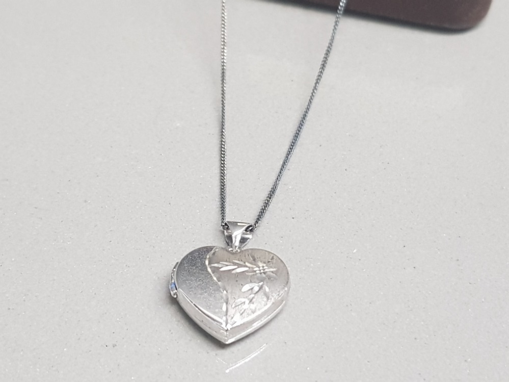 Silver heart shaped locket and chain 2.56g gross