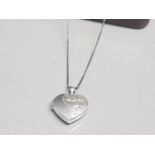 Silver heart shaped locket and chain 2.56g gross