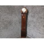 An art deco oak cased granddaughter clock by Haller with Arabic dial 155cm high.