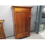 Mahogany empire style Louis Henry double door wardrobe fitted with a single drawer, with key, 111.