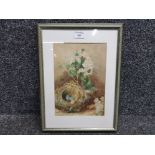 A watercolour of a bird's nest with eggs in 25 x 17cm.