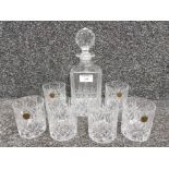 A cut glass decanter and six associated by Capri crystal.