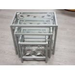 Nest of 3 metal & glass topped tables