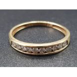 Ladies 9ct yellow gold cubic zirconia band ring, size P½, 1.3g gross