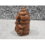 Handcarved hardwood Netsuke in the form of frog & snail on barrel, signed on base