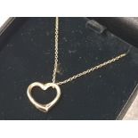 9ct yellow gold heart shaped pendant & 9ct gold necklace, 1.3g