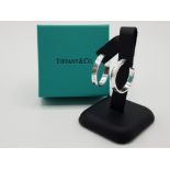 A pair of Tiffany & Co silver earrings 6.89g with original box.
