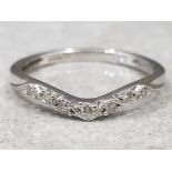 9ct white gold seven stone diamond set band, size K½, 1.4g