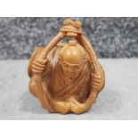 Large handcarved hardwood Netsuke in the form of a old japanese man, height 5cm x length 5cm