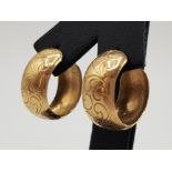 A pair of 9ct yellow gold cuff earrings 3.56g