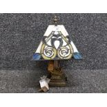 A small Tiffany style table lamp 34cm high.