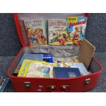 Red suitcase containing miscellaneous annuals & books from the 50s including religious and