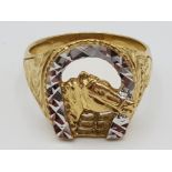 A gents 10ct yellow and white gold dress ring of horse shoe and horse head design size V 6.4g