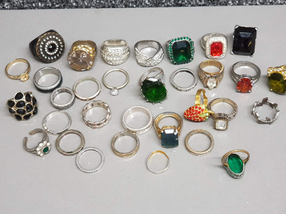 Box containing 30+ mixed costume jewellery rings & bands